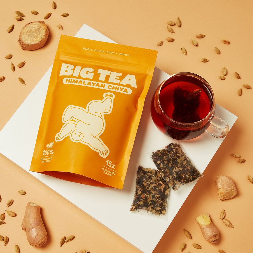 Himalayan Chiya brewed cup with loose spices and tea leaves